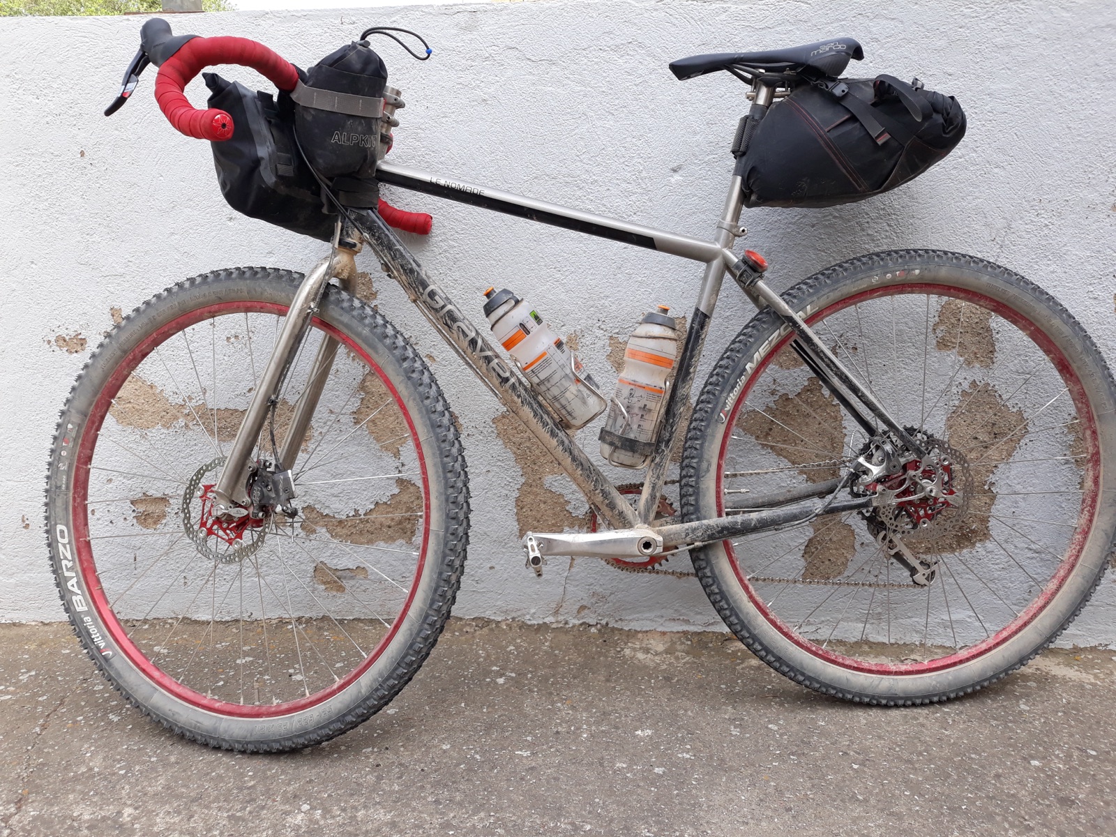 Gravel bicycle equipped with frame, handlebar and saddle bikepacking bags